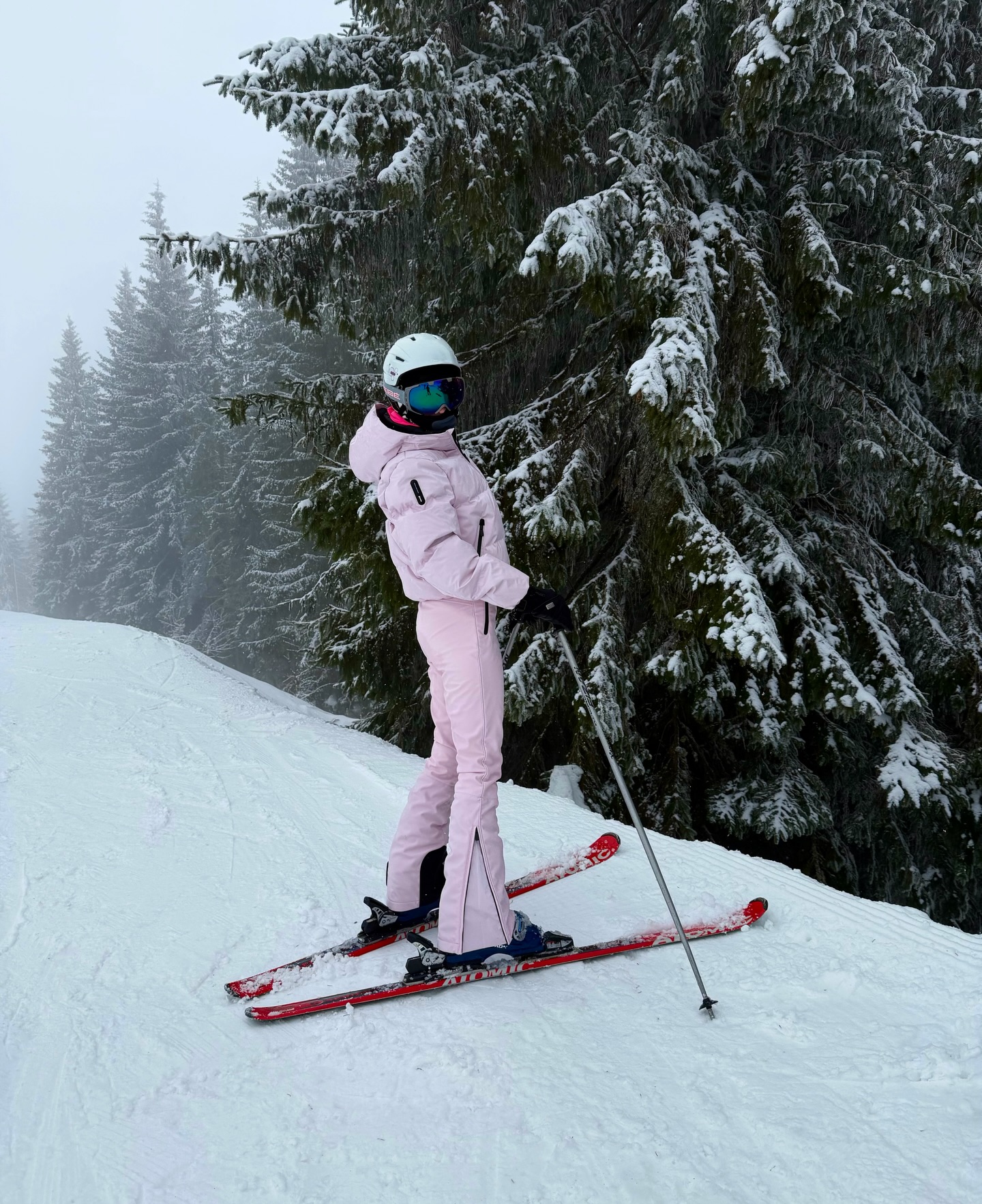 Pastel Pink Ski Suit For A Chic Winter Escape