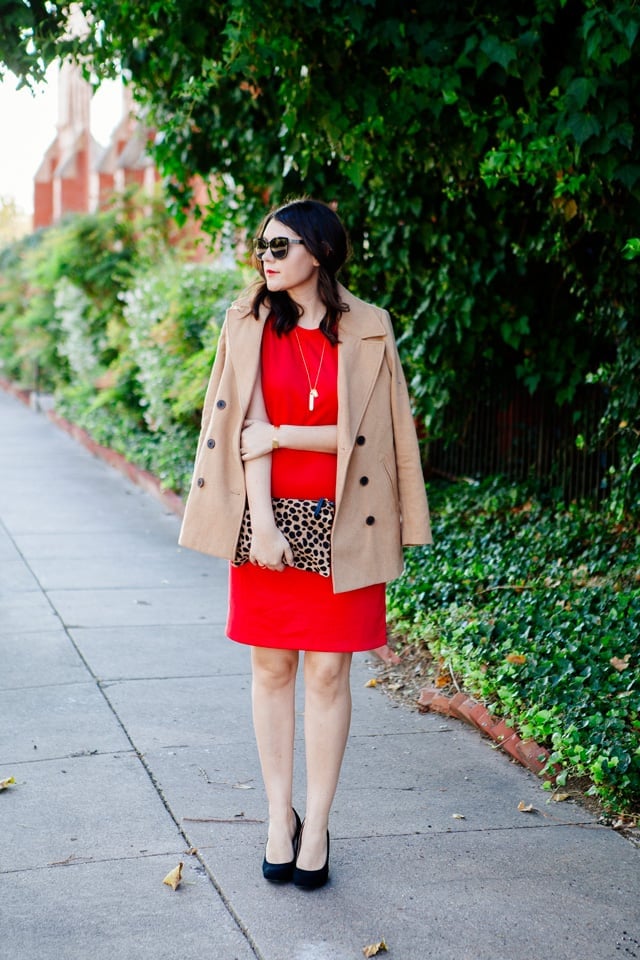 Camel double-breasted peacoat over a red dress with leopard clutch Camel double-breasted peacoat over a red dress with leopard clutch — Peacoat Outfits