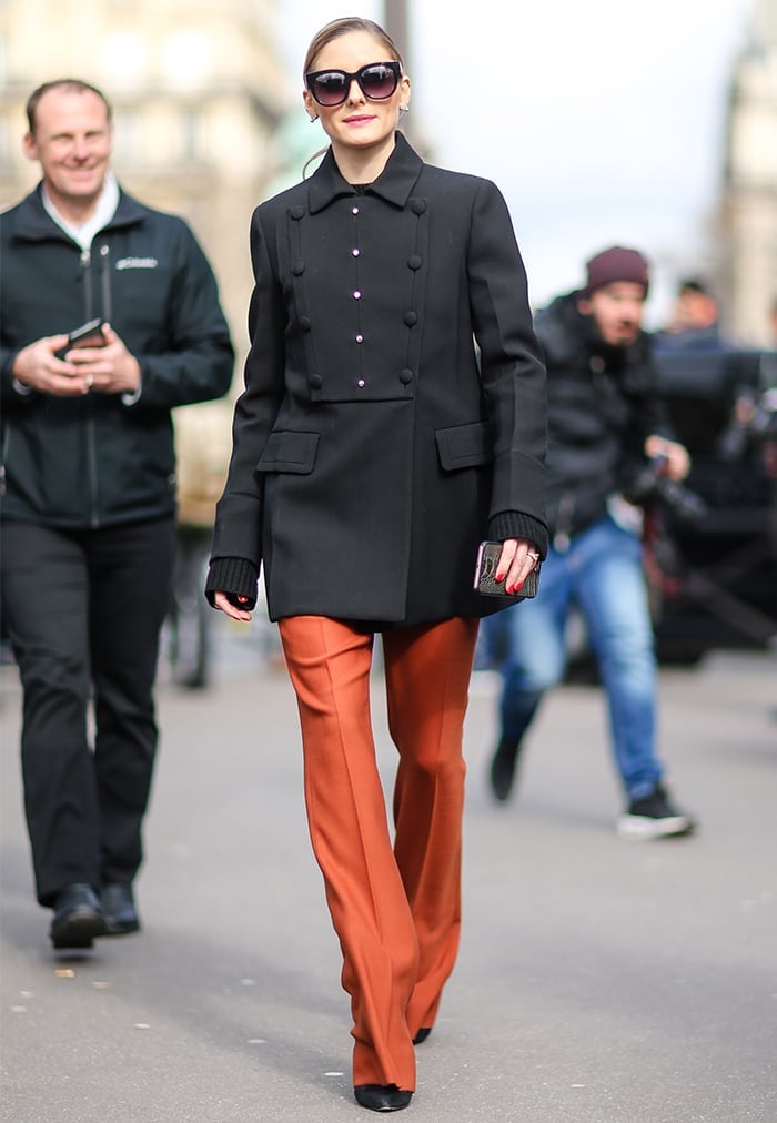 Black double-breasted peacoat with burnt orange flared trousers Black double-breasted peacoat with burnt orange flared trousers — Peacoat Outfits