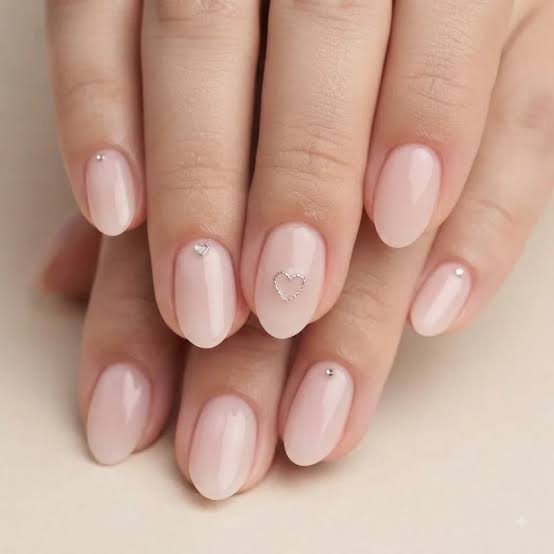 Silver Studs And Hearts Sheer Milky Pink Almond Silver Studs And Hearts Sheer Milky Pink Almond — Pink Almond Nails