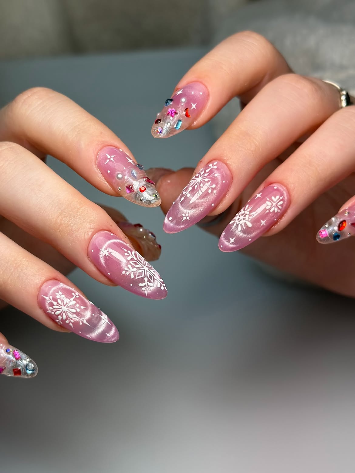 Pink Snowflake Almond Gel Nails with Rhinestones
