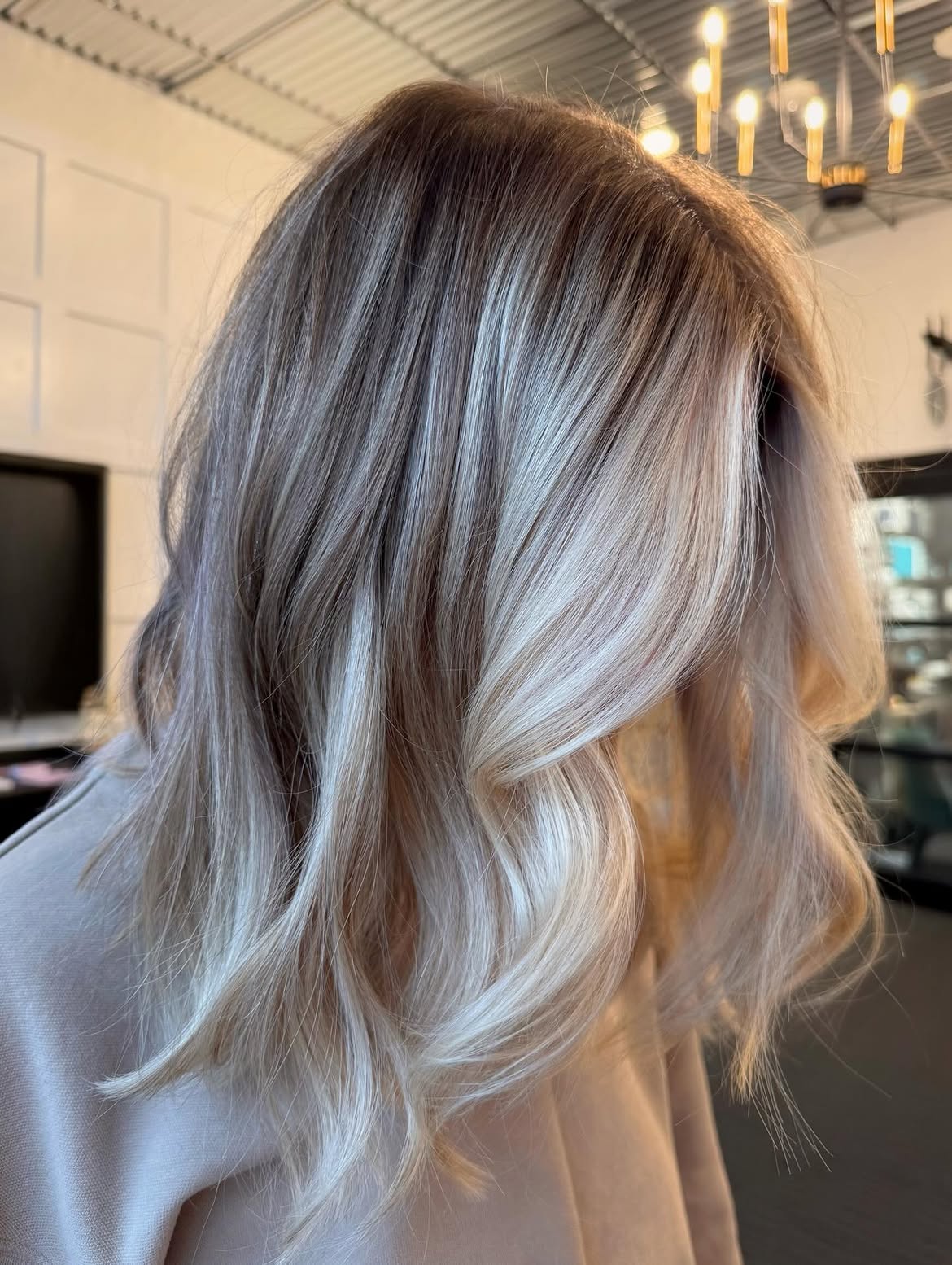 Platinum Blonde Balayage With Soft Waves