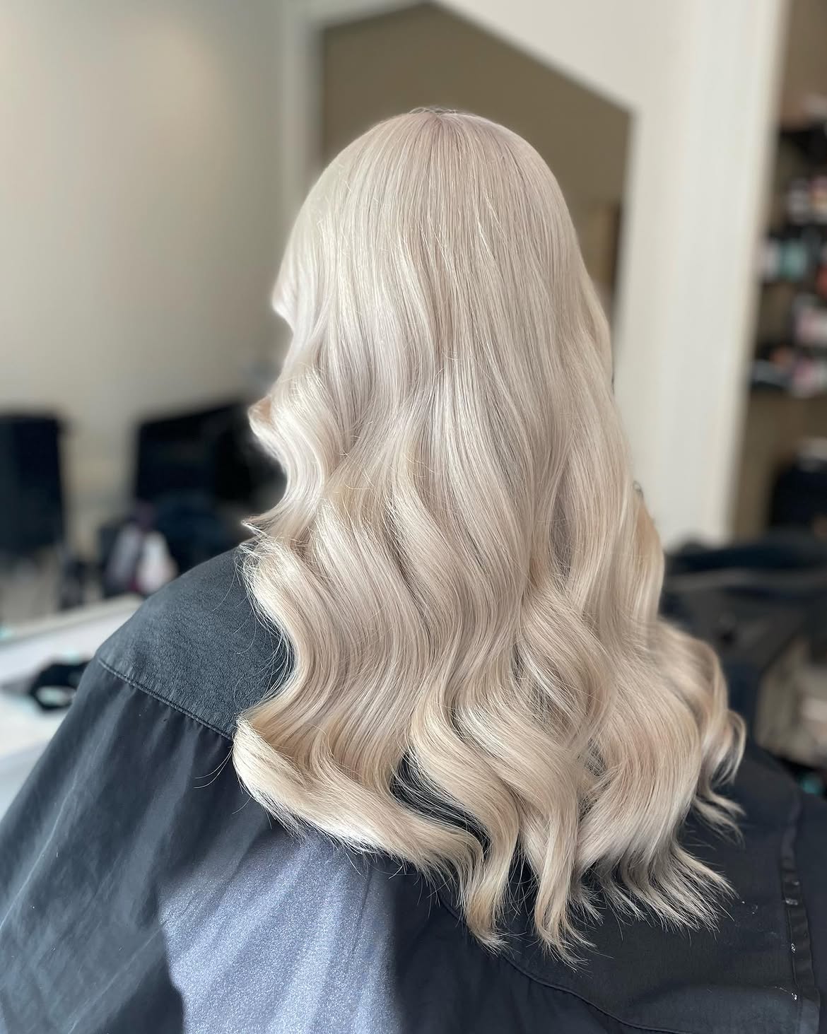 Platinum Blonde Waves With Root Smudge