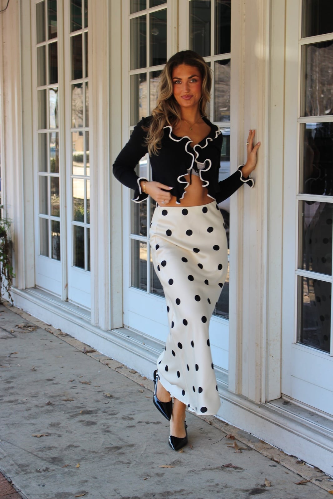 Cream Polka Dot Midi Skirt With Black Cardigan, Close-Up Take Cream Polka Dot Midi Skirt With Black Cardigan, Close-Up Take — Polka Dot Skirt Outfit