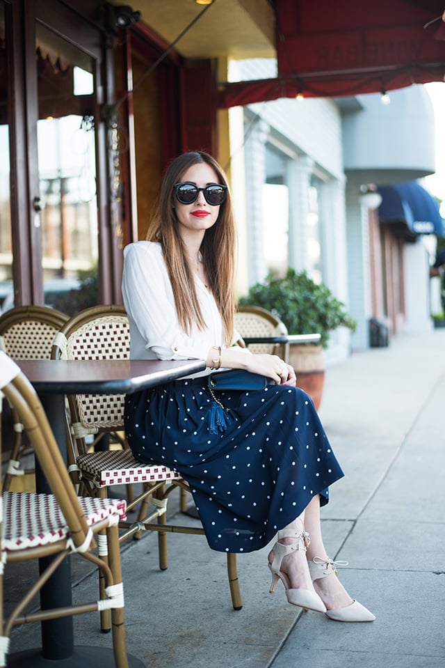 Navy Polka Dot Midi Skirt With Blouse and Heels, Blue Clutch Bag Navy Polka Dot Midi Skirt With Blouse and Heels, Blue Clutch Bag — Polka Dot Skirt Outfit