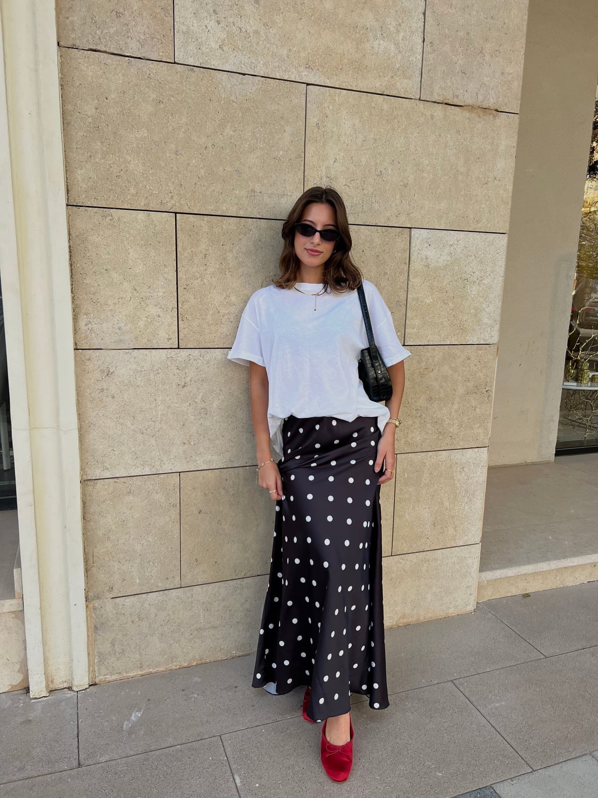 Black Satin Polka Dot Maxi Skirt With White T-shirt, Close-Up Take Black Satin Polka Dot Maxi Skirt With White T-shirt, Close-Up Take — Polka Dot Skirt Outfit