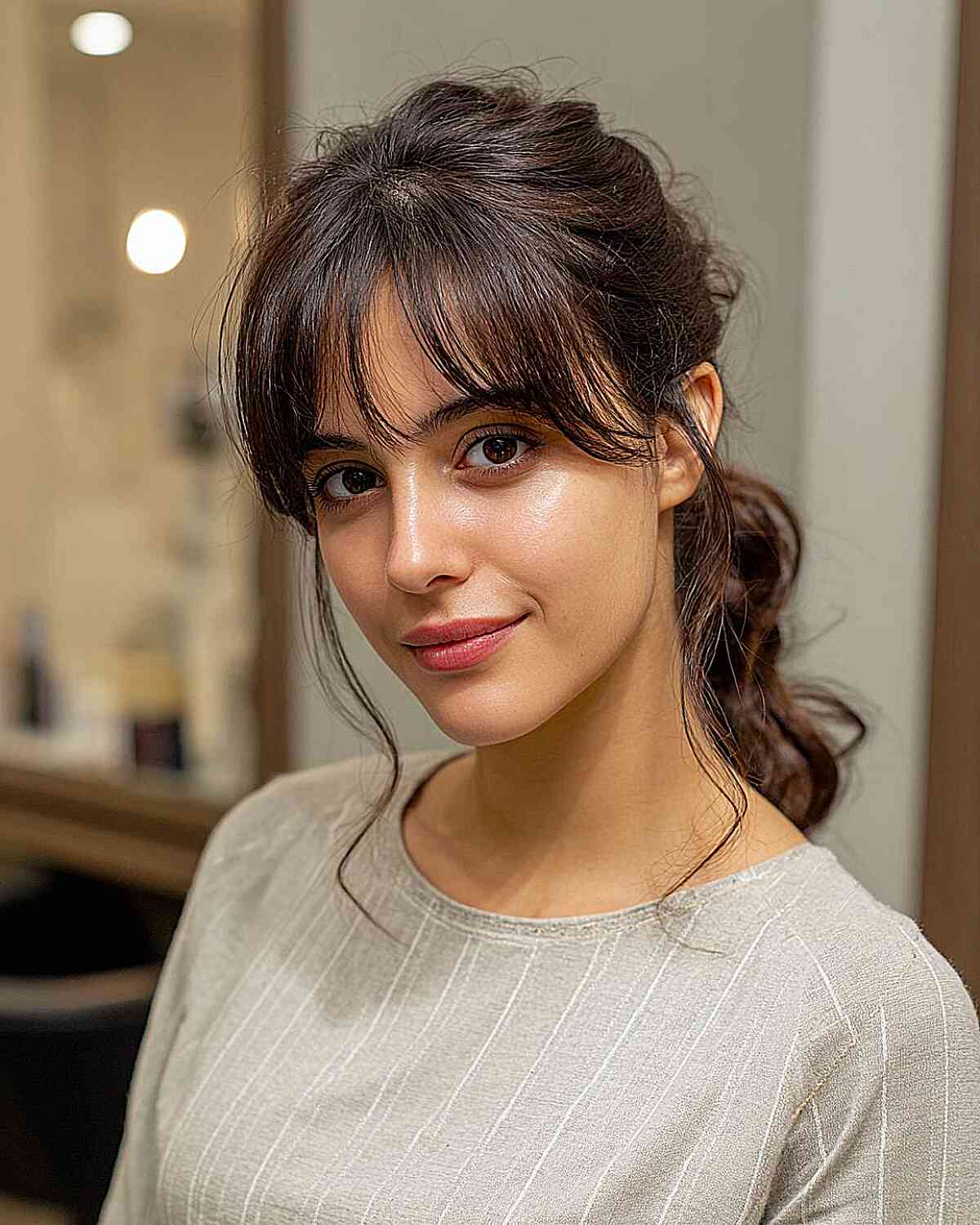 Loose Shoulder Length Ponytail With Wispy Bangs Loose Shoulder Length Ponytail With Wispy Bangs — Ponytail with Bangs