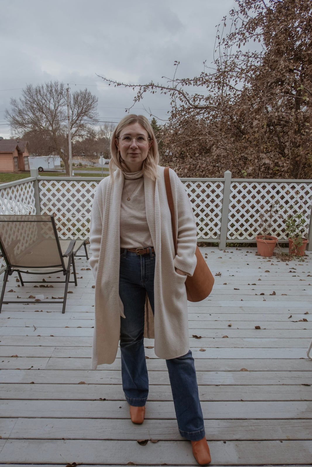 Cream turtleneck with long knit cardigan and straight-leg jeans Cream turtleneck with long knit cardigan and straight-leg jeans — Postpartum Outfits