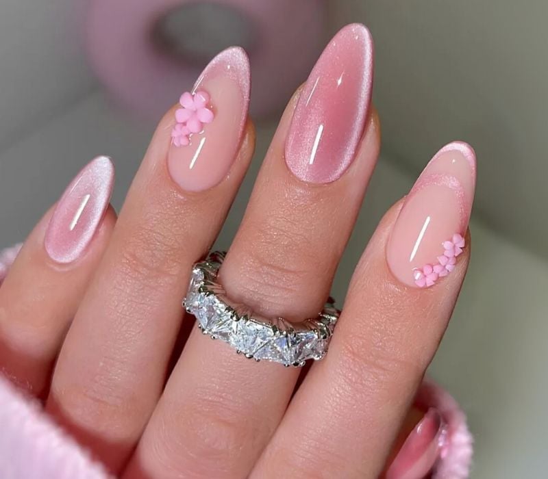 Pink Cat-Eye with Floral Charms Almond Nails Pink Cat-Eye with Floral Charms Almond Nails — Preppy Nails