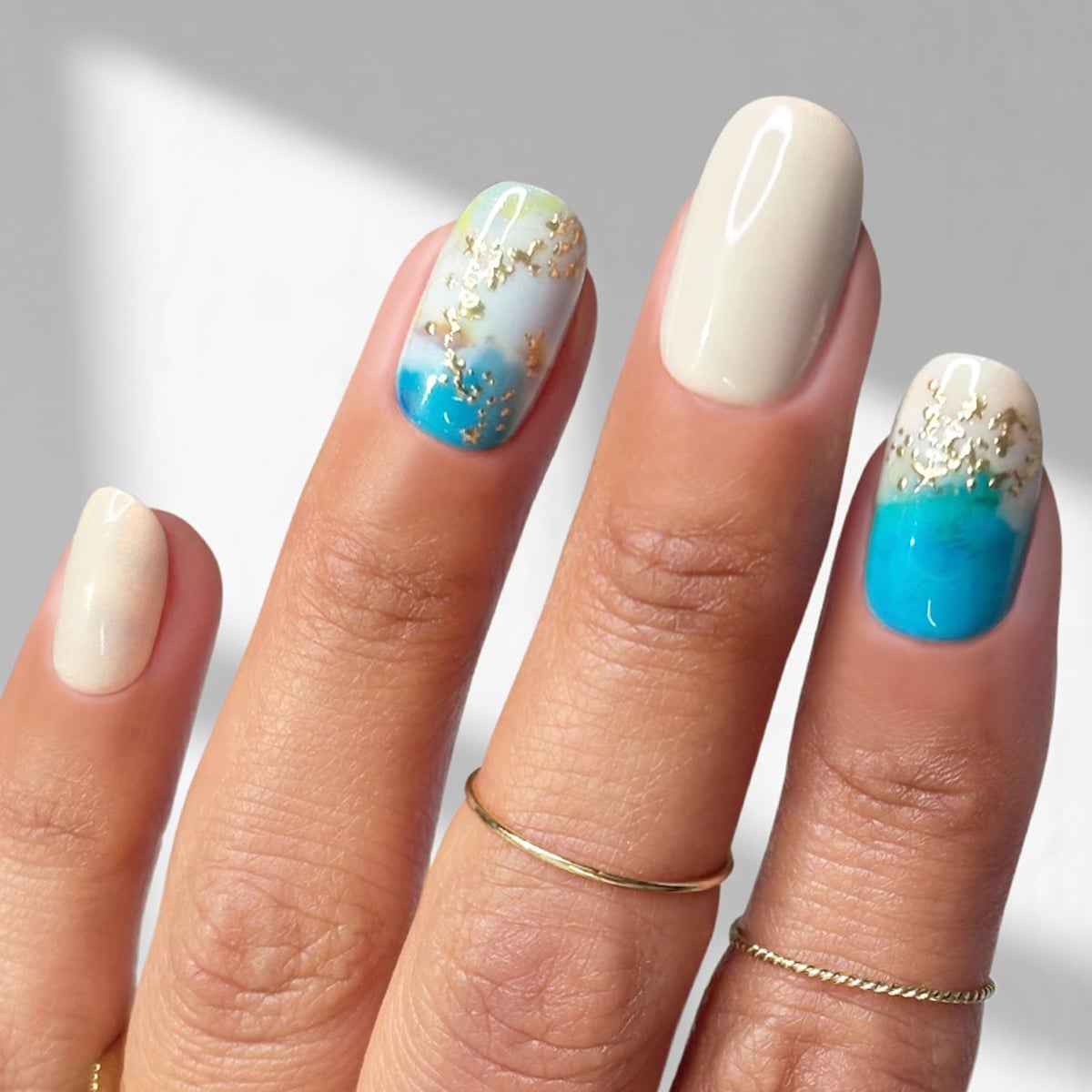 Glossy Blue Abstract Gold Foil Short Oval Nails Glossy Blue Abstract Gold Foil Short Oval Nails — Press On Nails