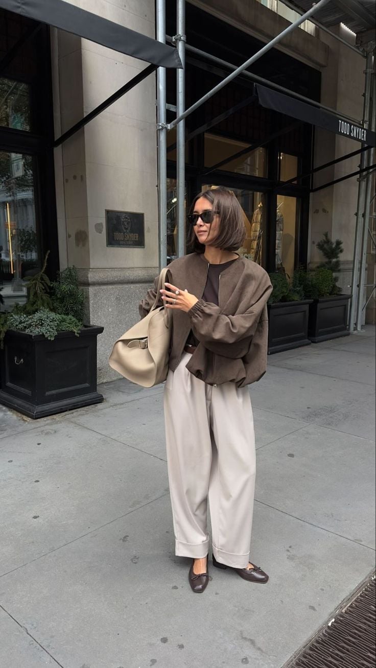 Cropped brown bomber jacket with cream trousers Cropped brown bomber jacket with cream trousers — Professional Outfits