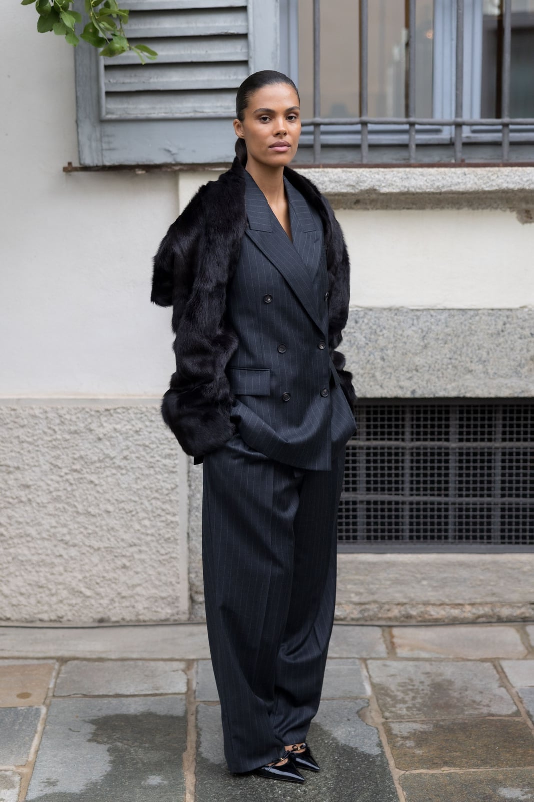 Dark pinstripe double-breasted suit with fur stole Dark pinstripe double-breasted suit with fur stole — Professional Outfits