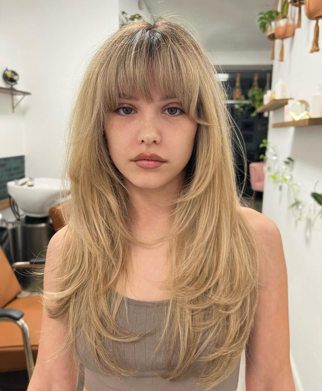 Dark Brown Layered Lob With Side-Swept Bangs Dark Brown Layered Lob With Side-Swept Bangs — Rachel Haircuts