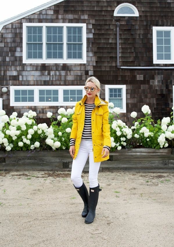 Yellow raincoat over striped shirt and white pants Yellow raincoat over striped shirt and white pants — Rainy Day Outfits
