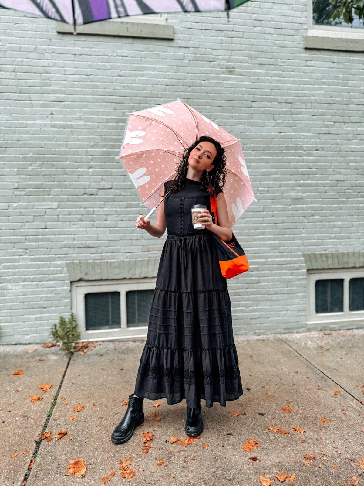 Black tiered midi dress with pink patterned umbrella Black tiered midi dress with pink patterned umbrella — Rainy Day Outfits