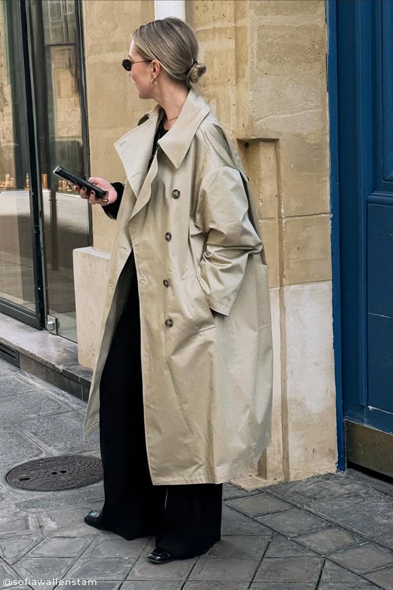Beige oversized trench coat with black top and wide-leg, Close-Up Take Beige oversized trench coat with black top and wide-leg, Close-Up Take — Rainy Day Outfits