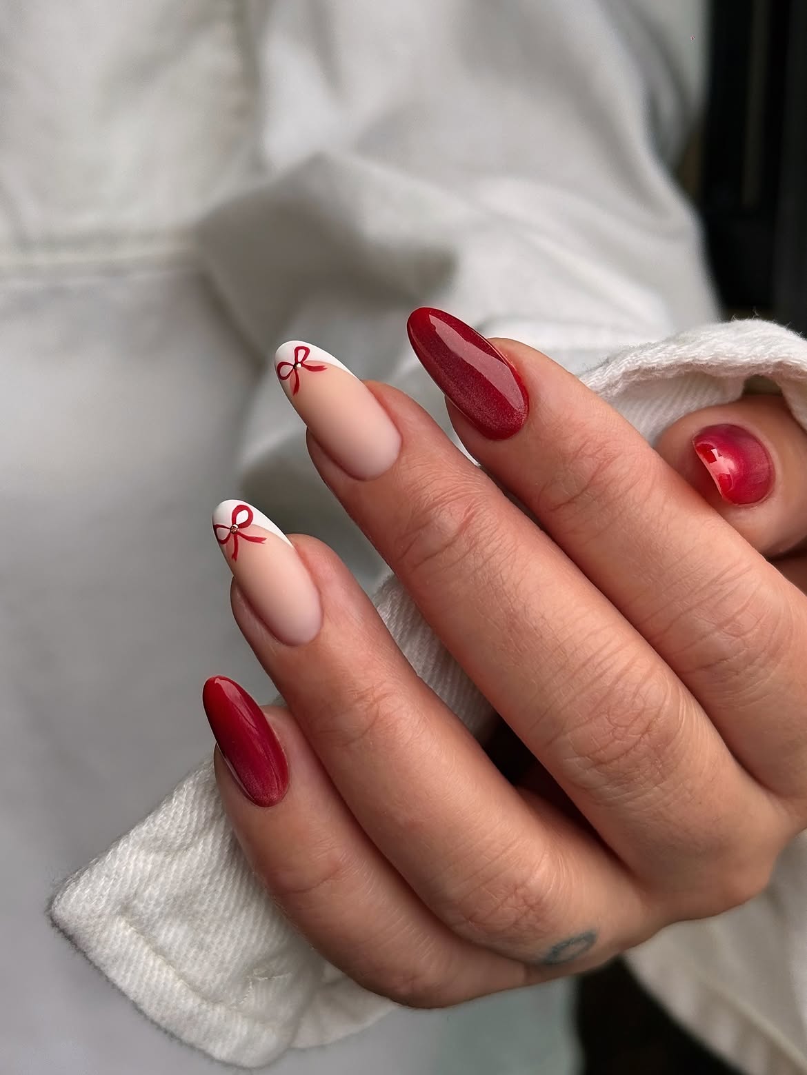 Red Bow French Tip Almond Nails