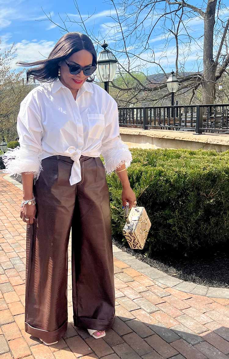 Leather trousers with feather cuff shirt Leather trousers with feather cuff shirt — Restaurant Outfit