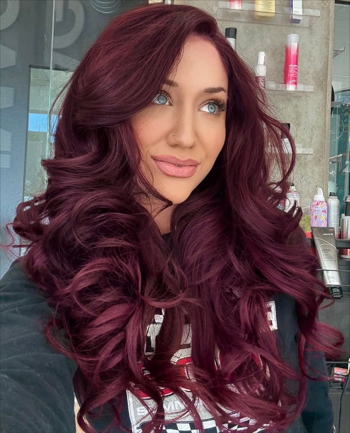 Rich Burgundy Waves With Deep Side Part