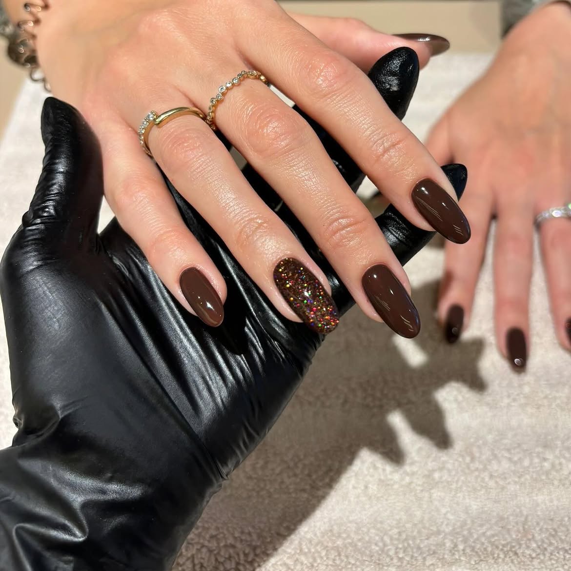 Rich Chocolate Glossy Nails with Glitter Accent