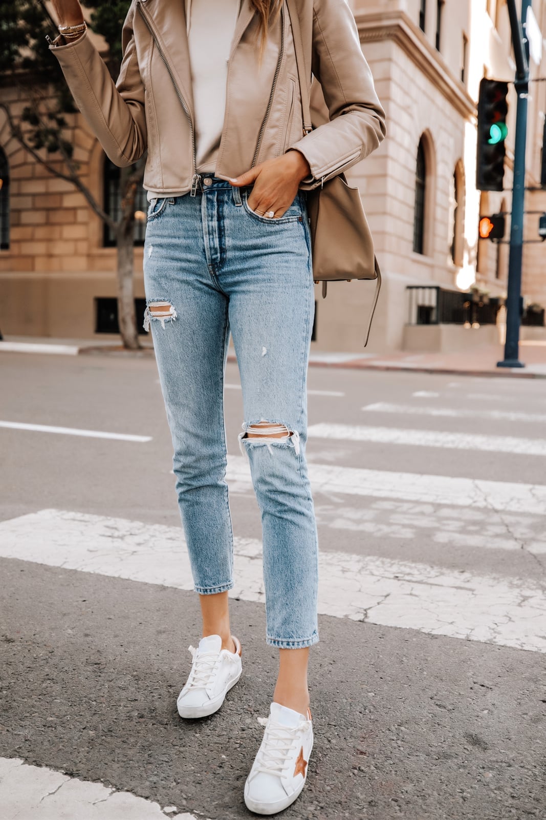 Ripped straight leg jeans with tan leather jacket and white sneakers Ripped straight leg jeans with tan leather jacket and white sneakers — Ripped Jeans Outfits