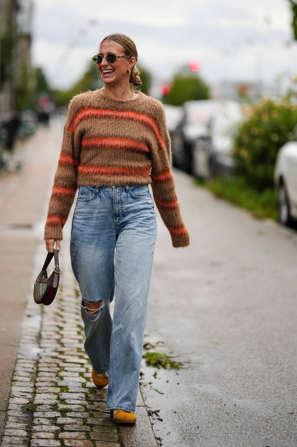 Light blue ripped straight-leg jeans with fuzzy striped sweater Light blue ripped straight-leg jeans with fuzzy striped sweater — Ripped Jeans Outfits