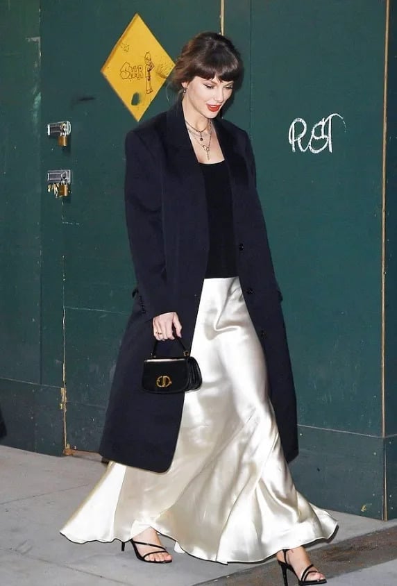 Flowing Ivory Satin Skirt With Long Black Coat Flowing Ivory Satin Skirt With Long Black Coat — Satin Skirt Outfits