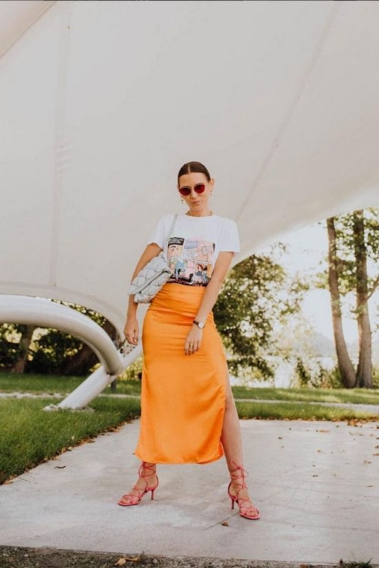 Orange Satin Skirt With Side Slit And Graphic T-Shirt Orange Satin Skirt With Side Slit And Graphic T-Shirt — Satin Skirt Outfits