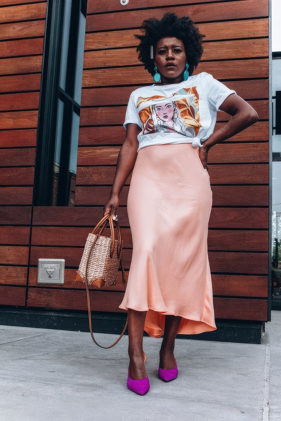 Peach Satin Midi Skirt With Graphic T-Shirt And Pink Heels Peach Satin Midi Skirt With Graphic T-Shirt And Pink Heels — Satin Skirt Outfits