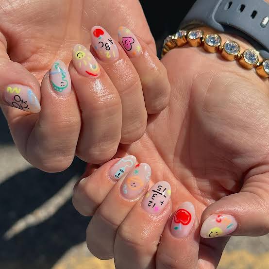 Medium Almond Playful School Icons Nails Medium Almond Playful School Icons Nails — School Nails