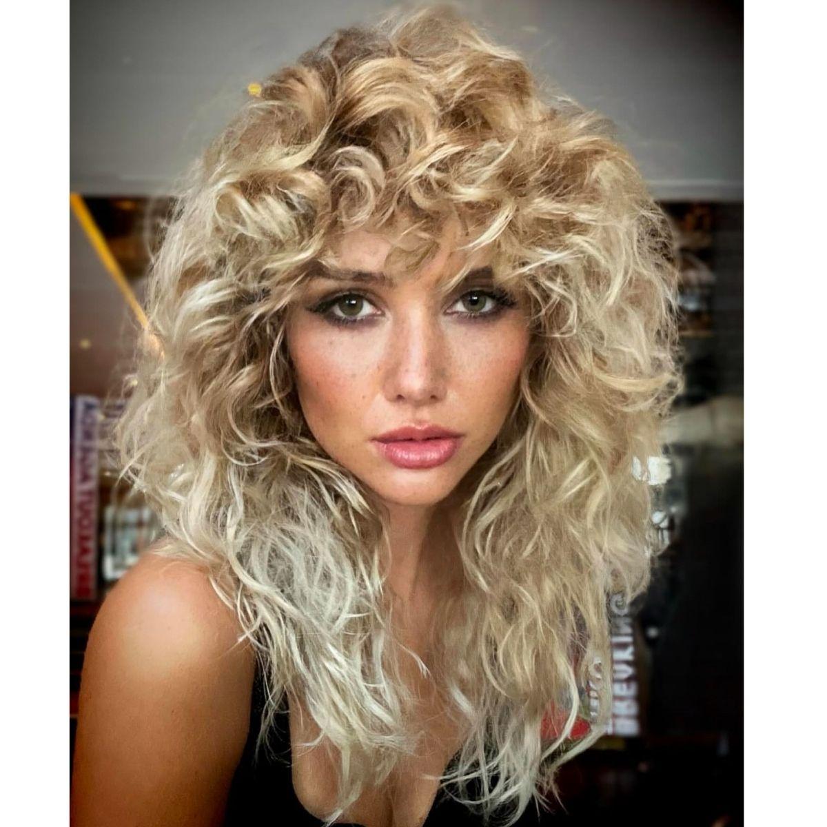 Blonde Shag With Root Shadow and Curtain Bangs Blonde Shag With Root Shadow and Curtain Bangs — Shag Haircut