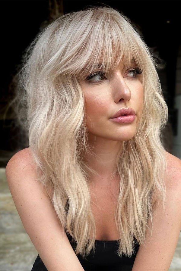 Mid-Back Platinum Blonde Shag With Wispy Bangs Mid-Back Platinum Blonde Shag With Wispy Bangs — Shag Haircut