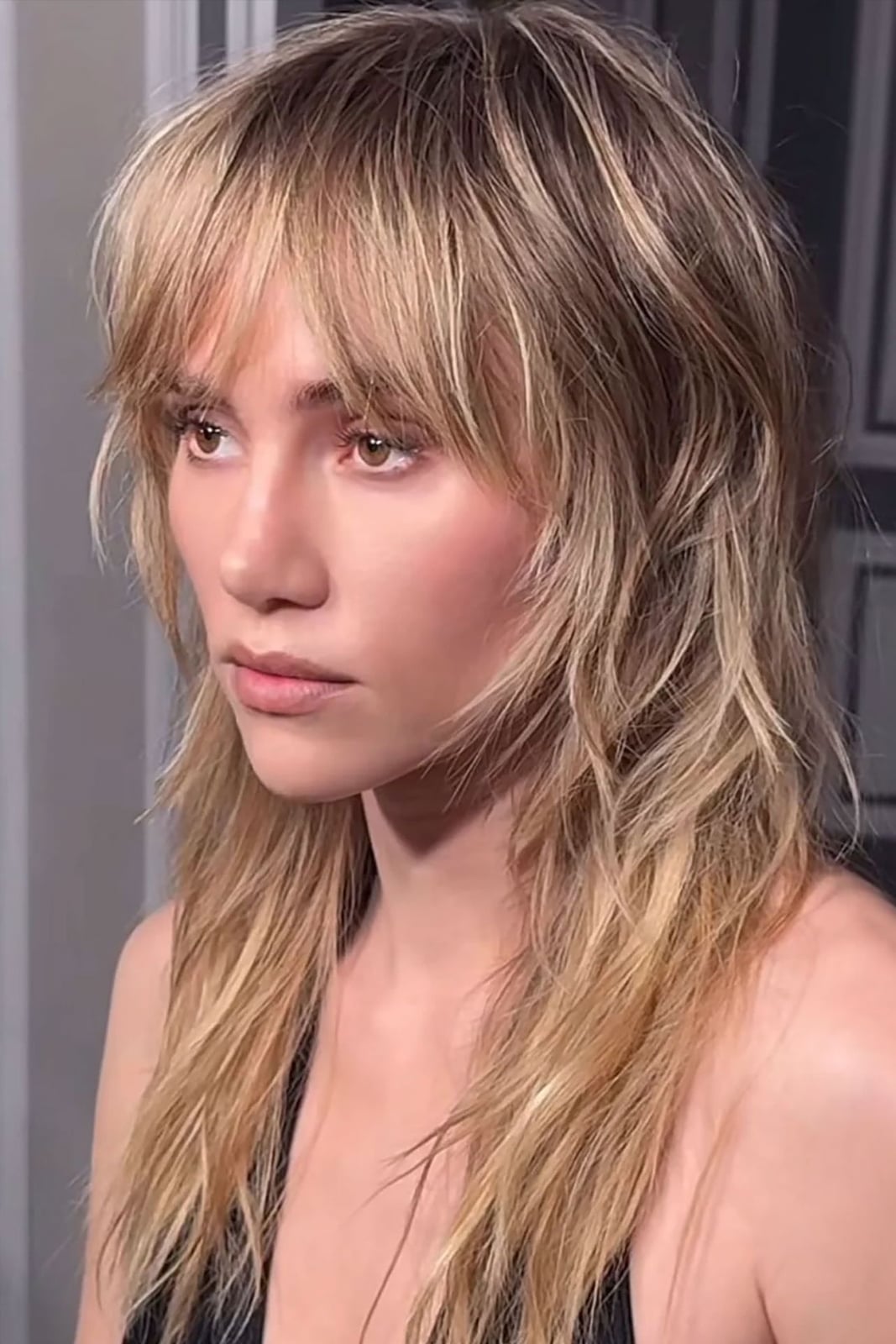 Shoulder Length Ash Blonde Shag With Curtain Bangs, Close-Up Take Shoulder Length Ash Blonde Shag With Curtain Bangs, Close-Up Take — Shag Hairstyles