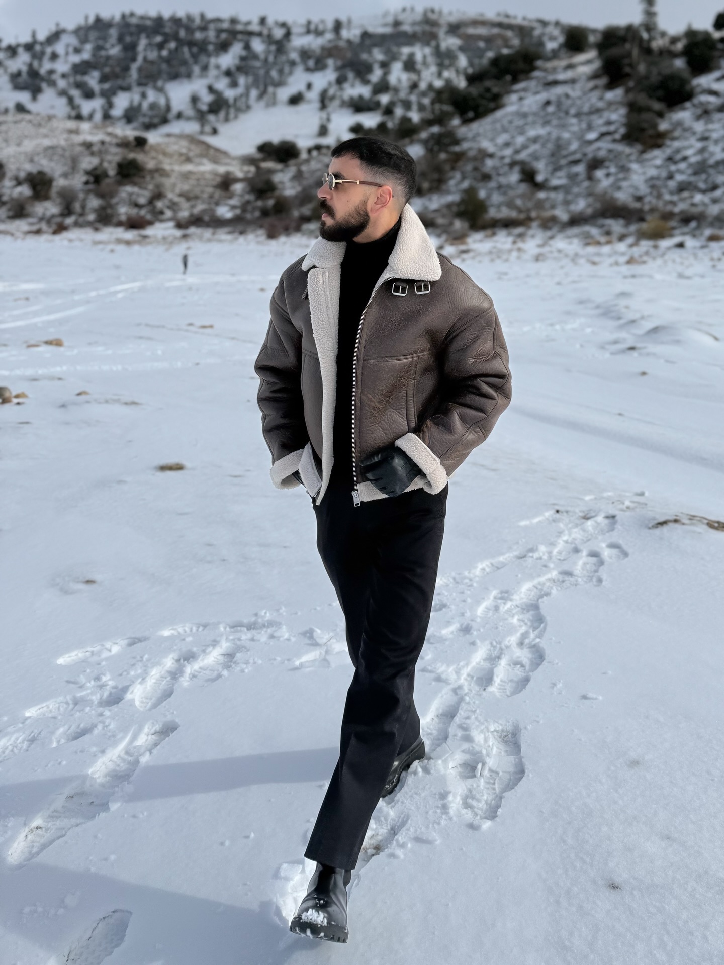 Shearling Aviator Jacket With Black Turtleneck And Trousers