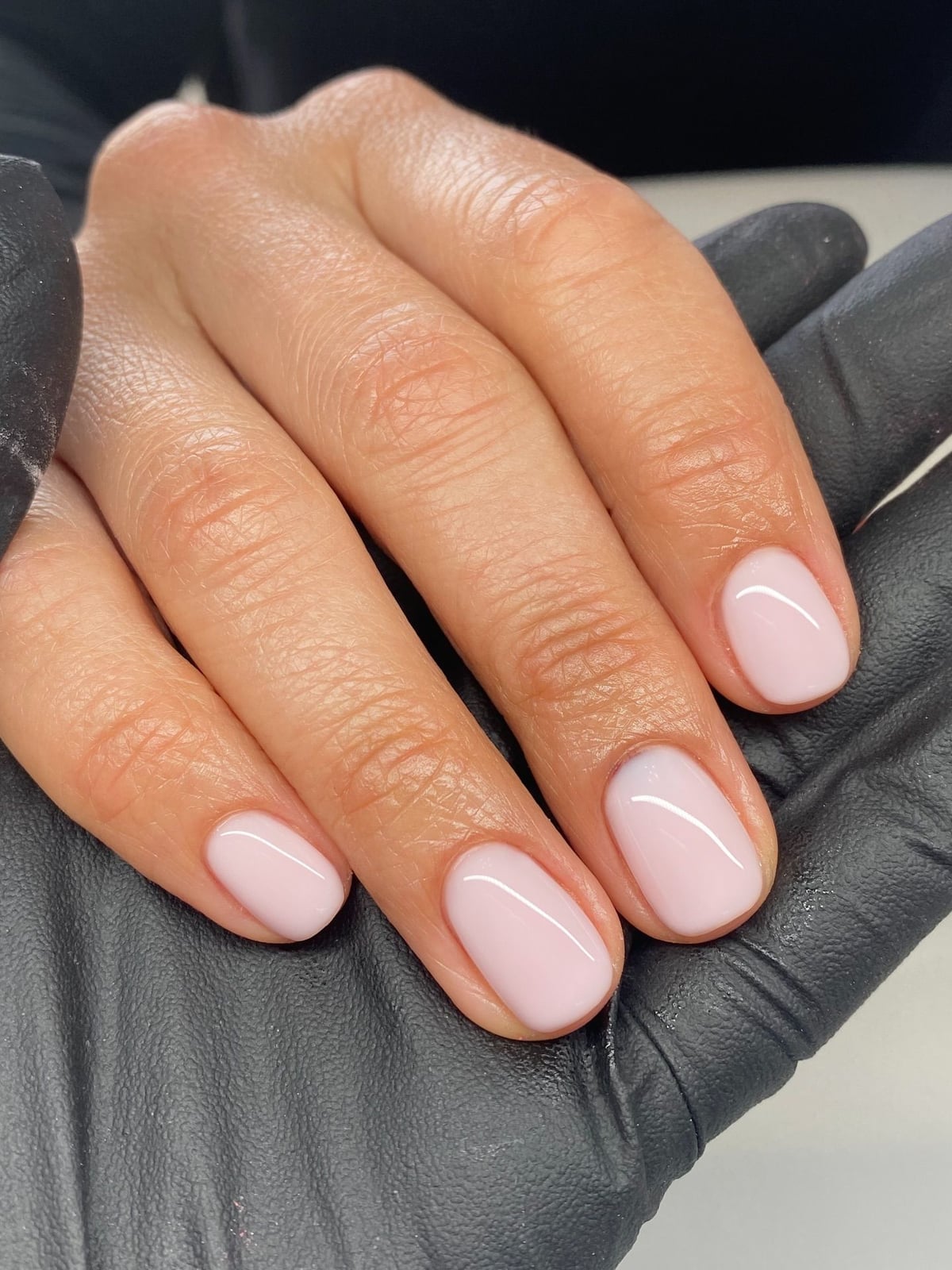 Sheer Pale Pink Glossy Nails, Close-Up Take Sheer Pale Pink Glossy Nails, Close-Up Take — Short Oval Nails