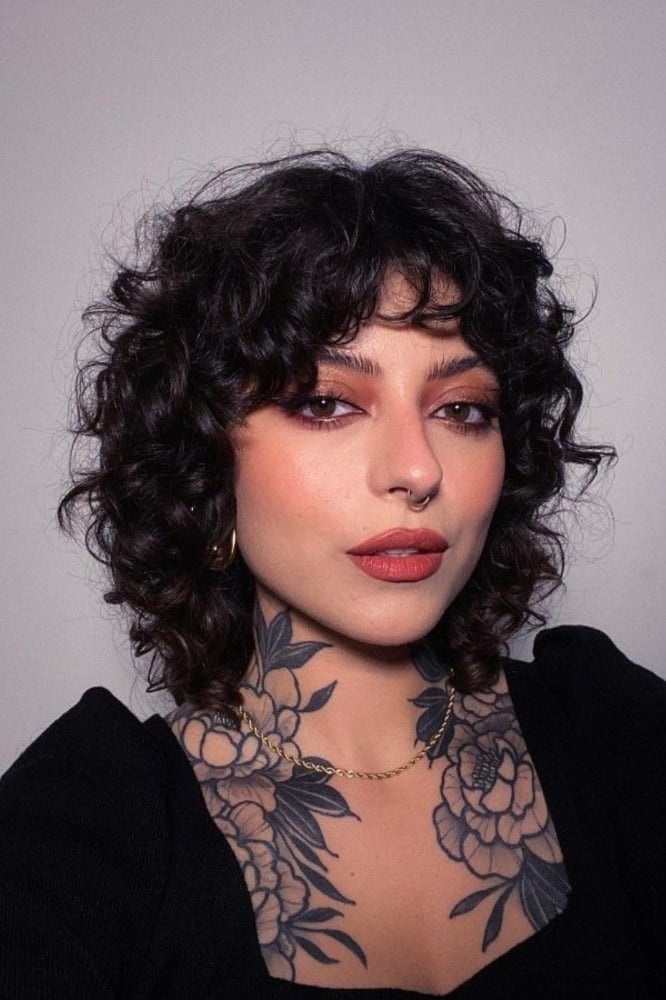 Chin Length Dark Brown Wolf Cut With Choppy Bangs Chin Length Dark Brown Wolf Cut With Choppy Bangs — Short Wolf Cut