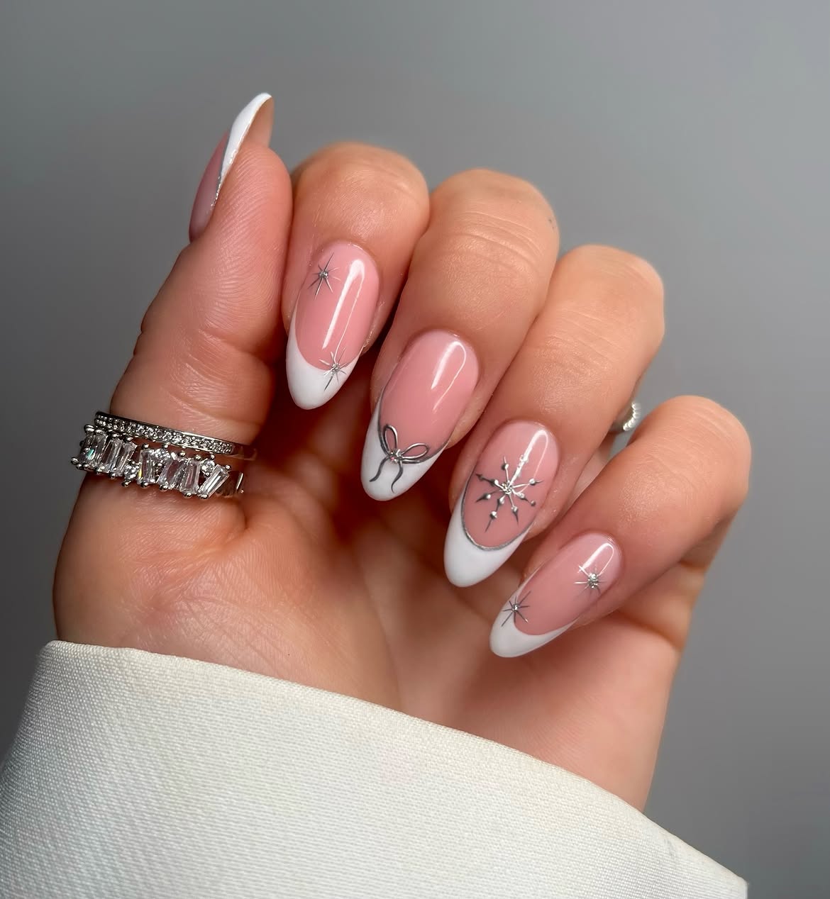 Silver Bow and Star French Tip Almond Nails
