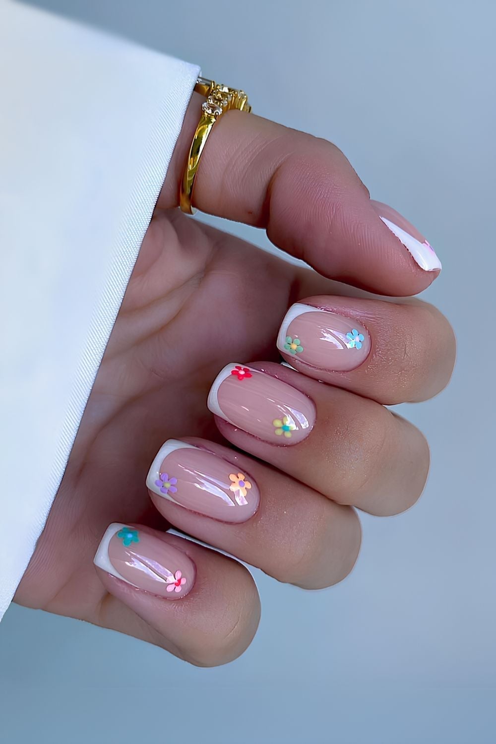 Nude Short Oval With French Tip Flower Accents Nude Short Oval With French Tip Flower Accents — Simple Short Nails