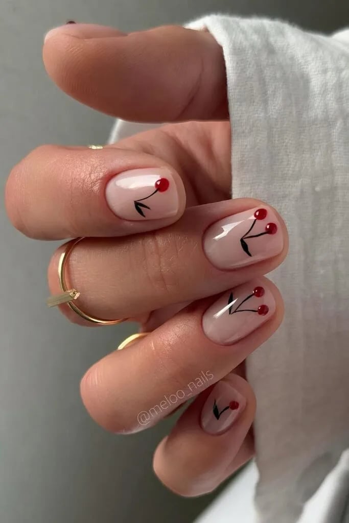 Sheer Pink Short Almond With Cherry Art Sheer Pink Short Almond With Cherry Art — Simple Short Nails