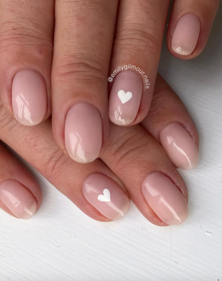 Sheer Pink Short Oval With White Heart Accent Sheer Pink Short Oval With White Heart Accent — Simple Short Nails