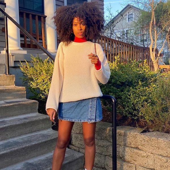 Blue Denim Skort With Cream Knit Sweater and Red, Close-Up Take Blue Denim Skort With Cream Knit Sweater and Red, Close-Up Take — Skort Outfits