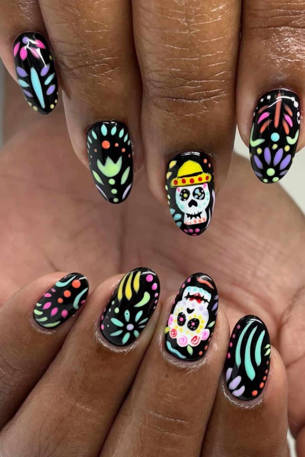 Medium Oval Black Skull with Neon Floral Patterns Medium Oval Black Skull with Neon Floral Patterns — Skull Nails