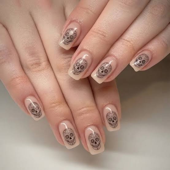 Medium Almond Nude with Black Outline Skull Designs Medium Almond Nude with Black Outline Skull Designs — Skull Nails