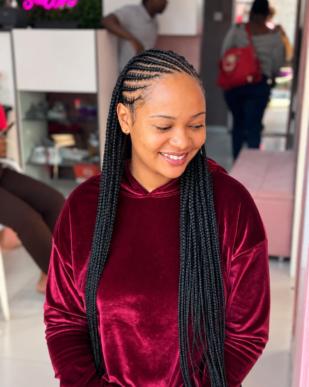 Sleek Cornrows With Long Braids