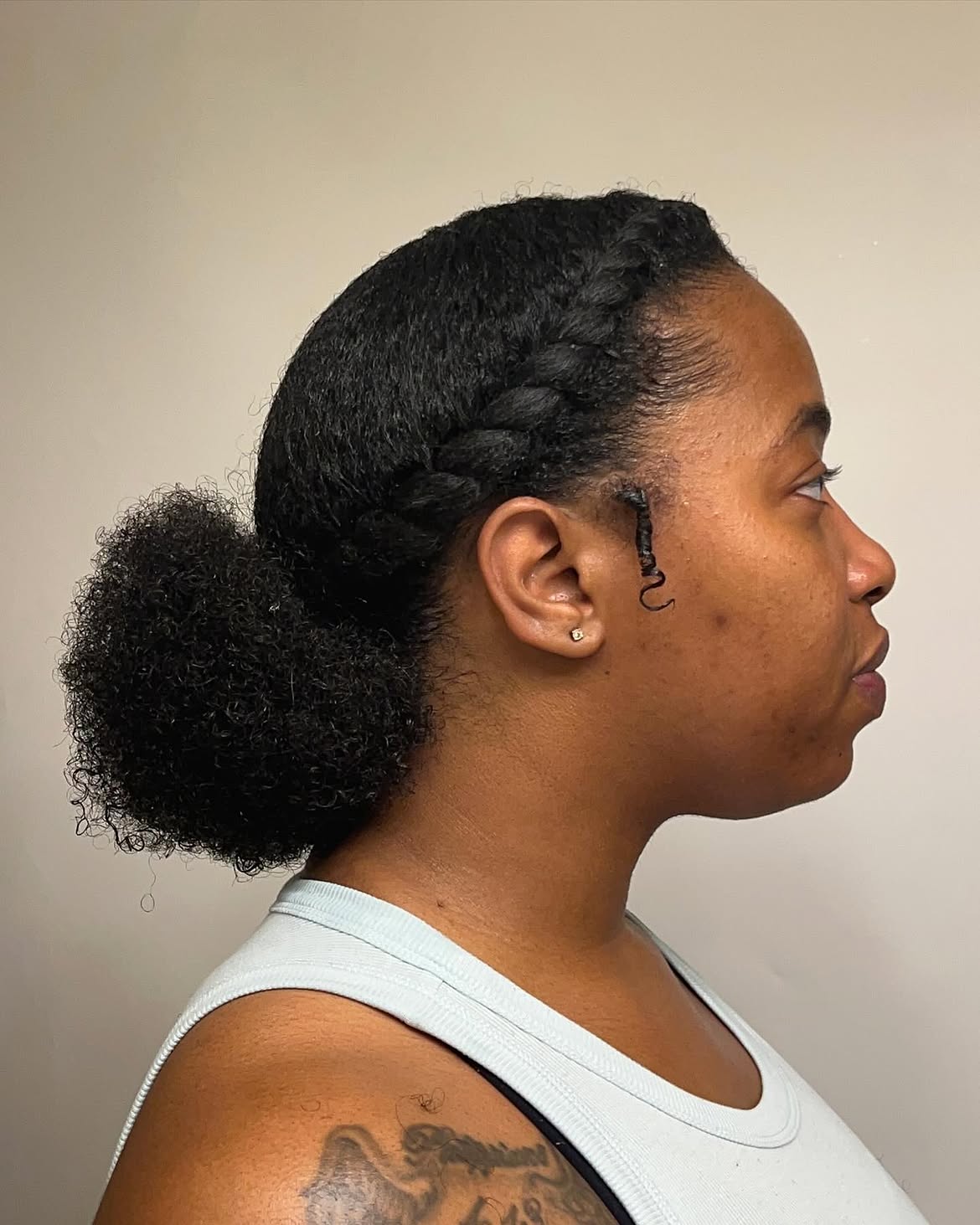Sleek Crown Braid With Textured Low Bun