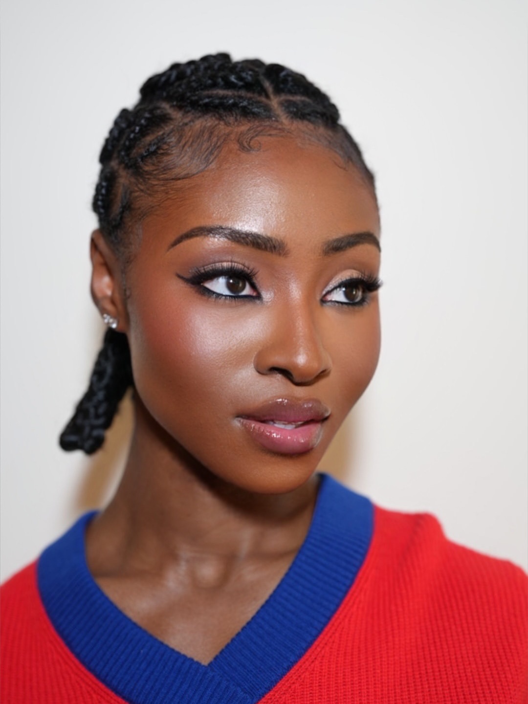 Sleek Feed-In Cornrow Pigtails With Laid Edges
