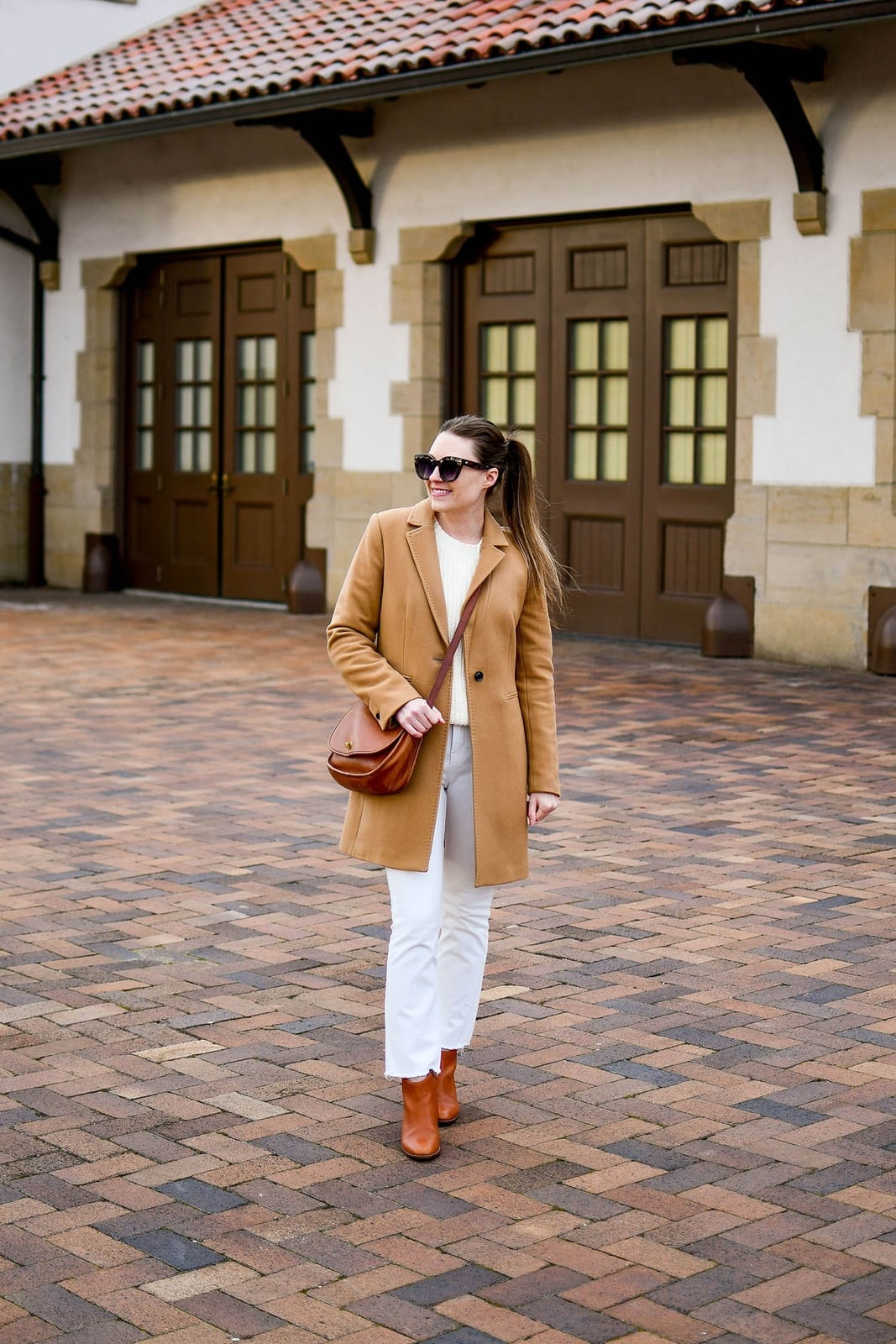 Camel coat over cream sweater and jeans Camel coat over cream sweater and jeans — Smart Casual Outfits