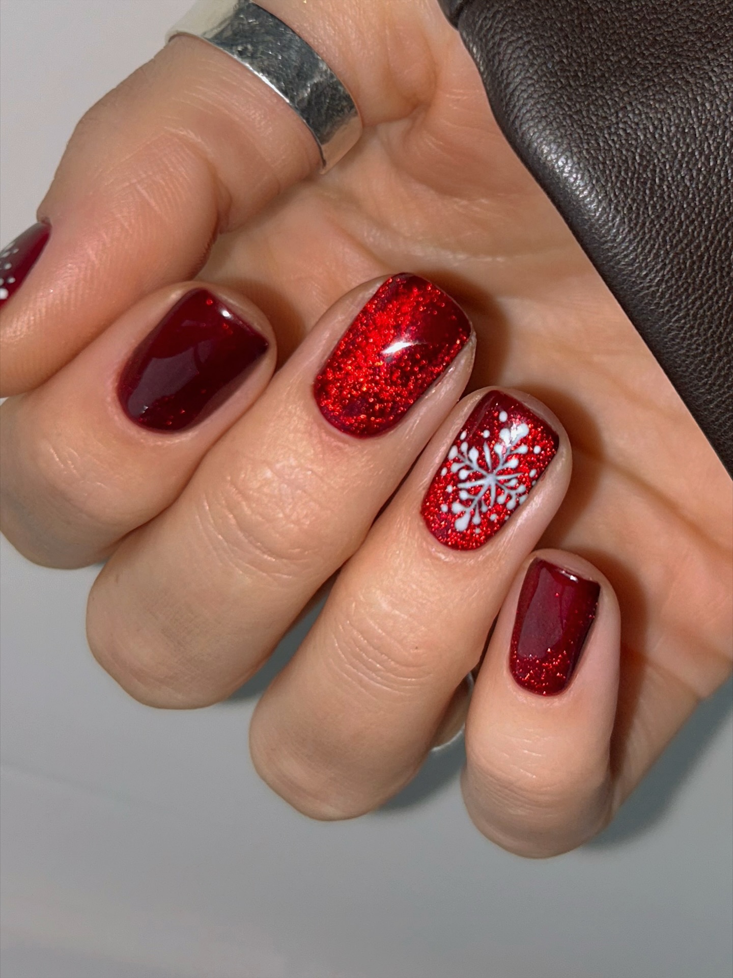 Sparkling Cranberry Snowflake Christmas Nails