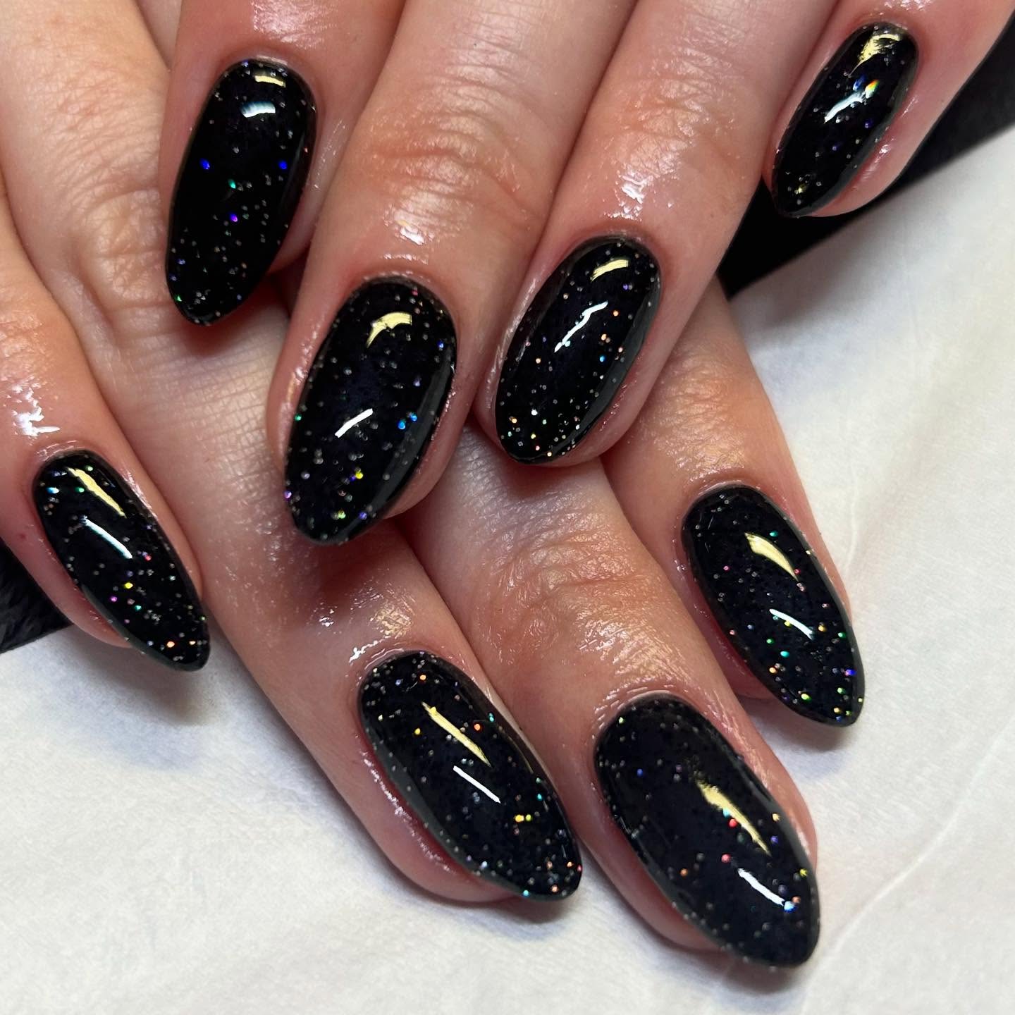 Sparkling Midnight Black Stiletto Nails