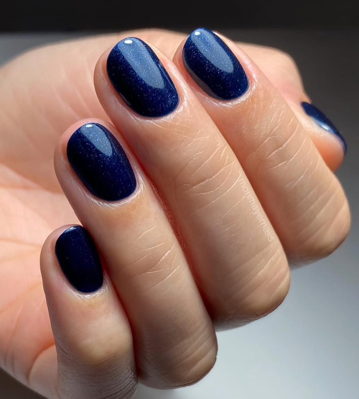 Sparkling Navy Blue Glossy Oval Nails